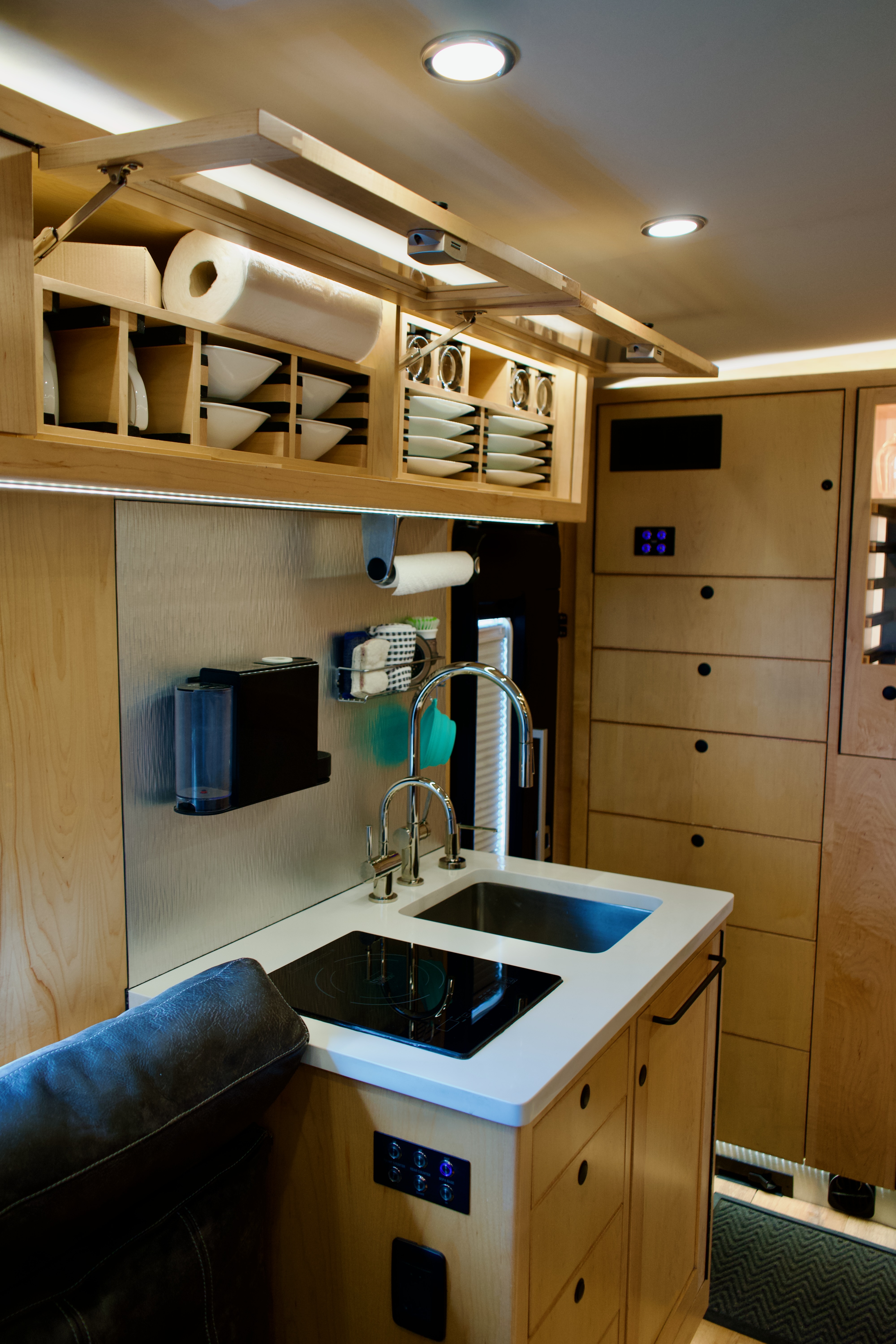 Galley kitchen with storage open