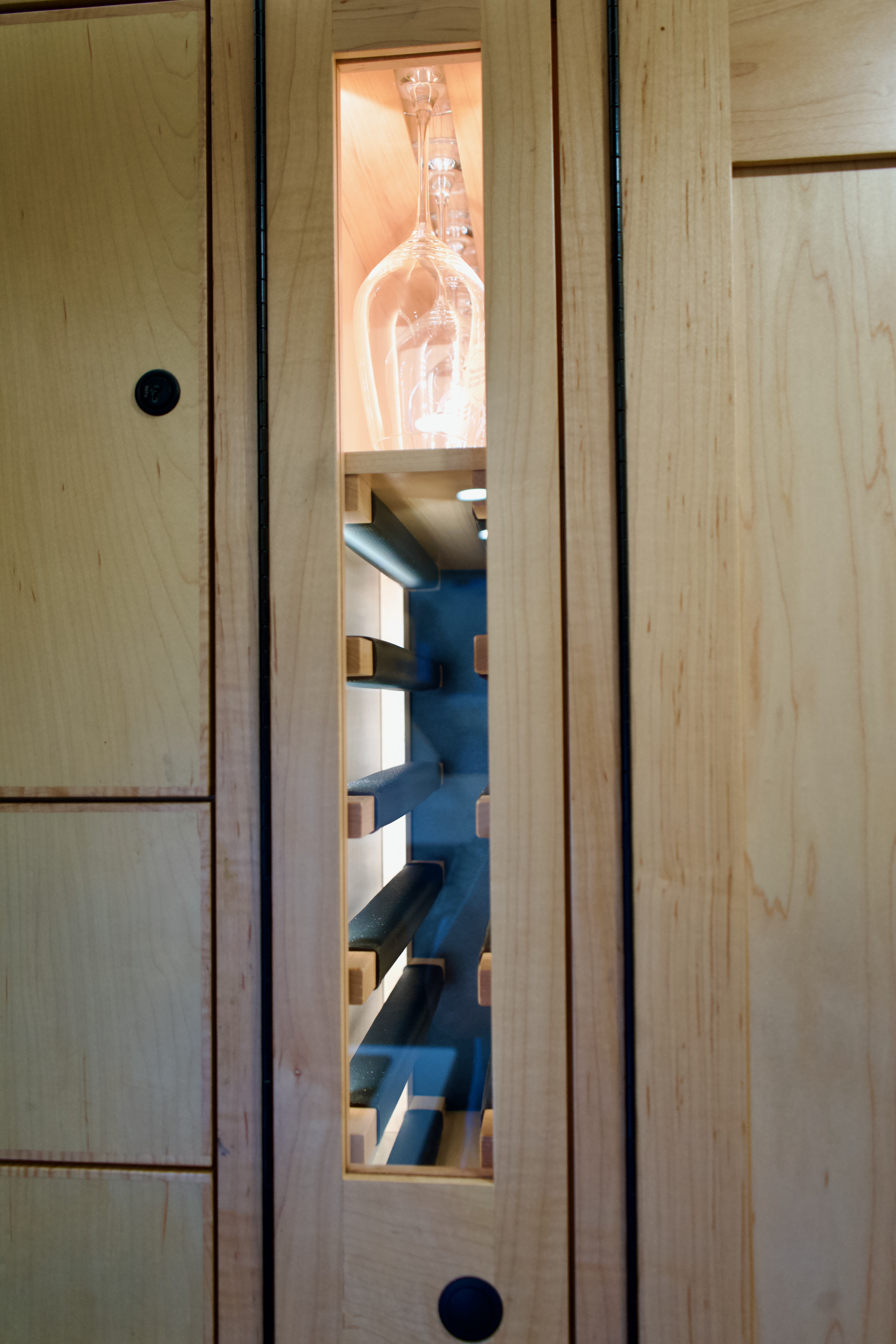 Built-in wine storage in maple cabinetry