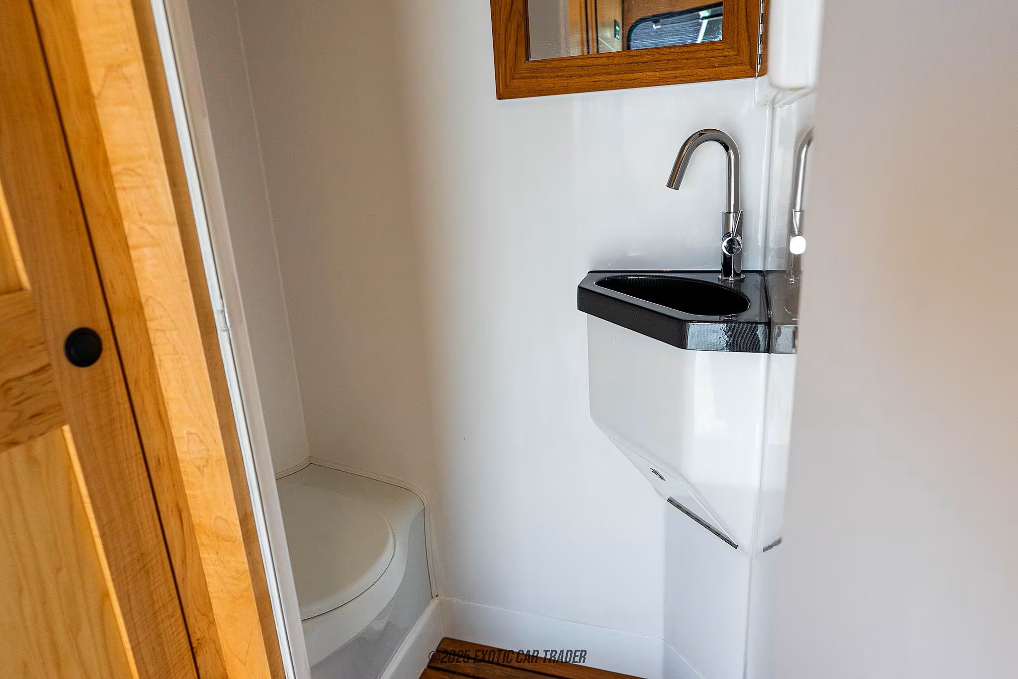 Enclosed bathroom with sink