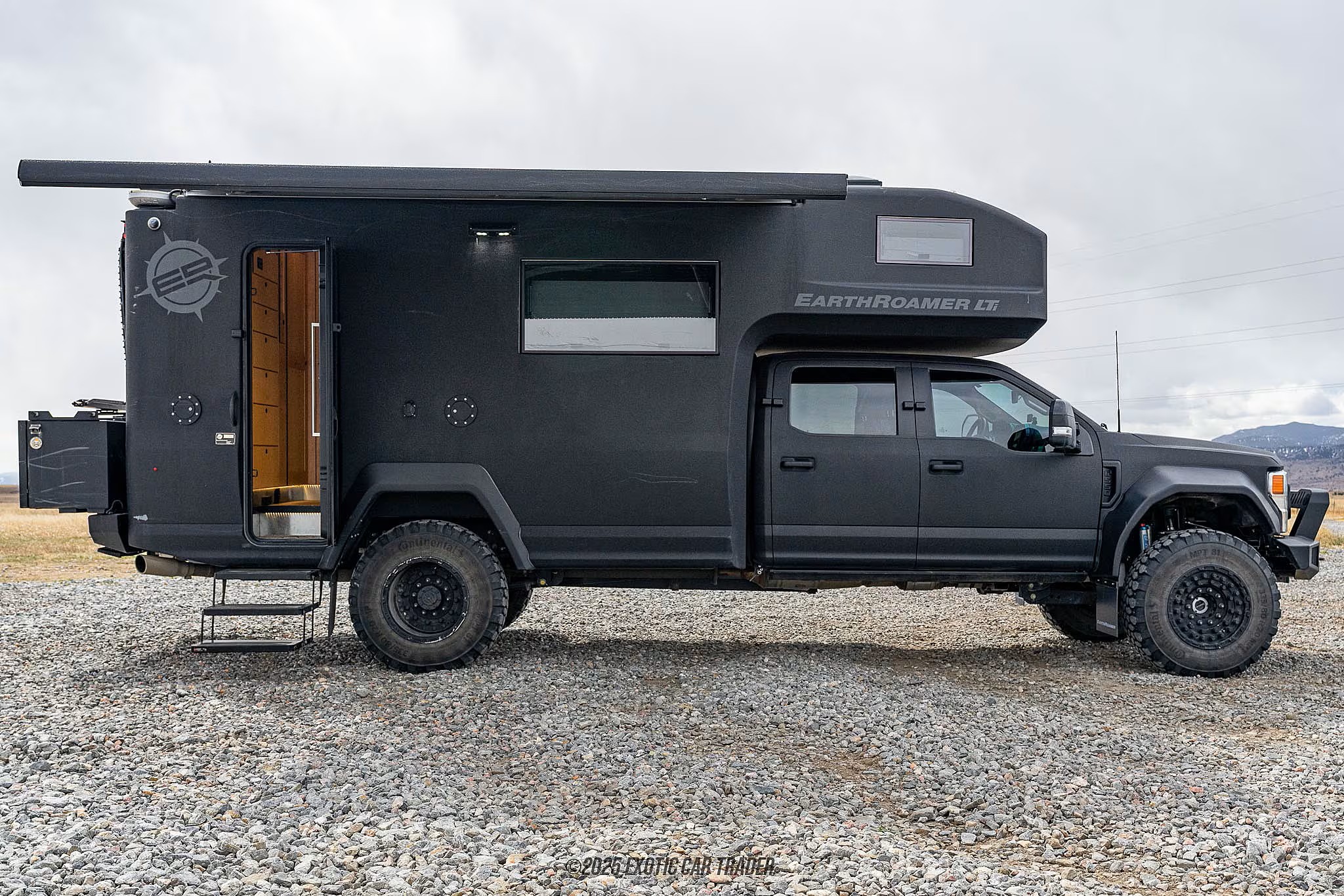 Side profile with door open and awning deployed