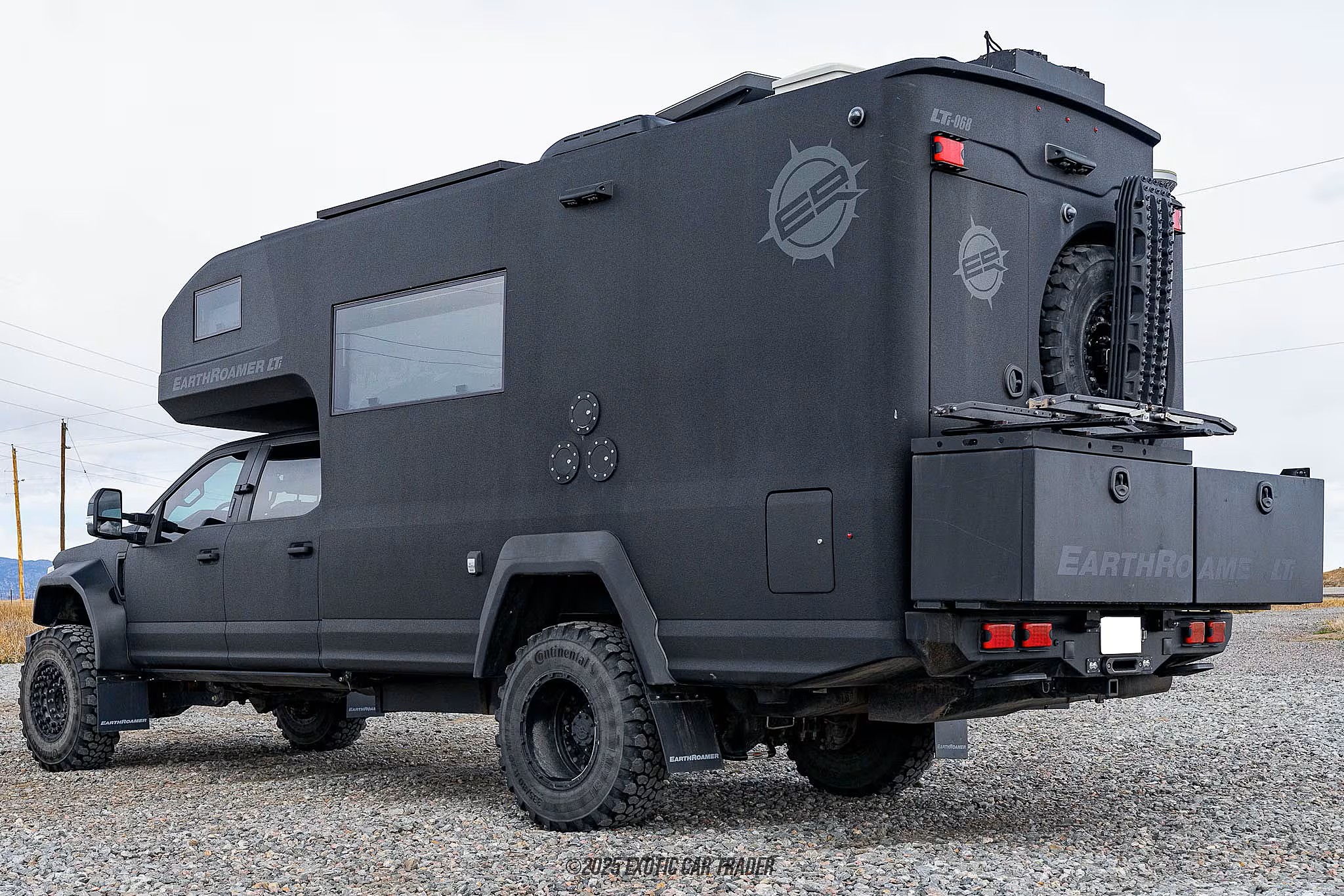 Rear quarter view with mountains