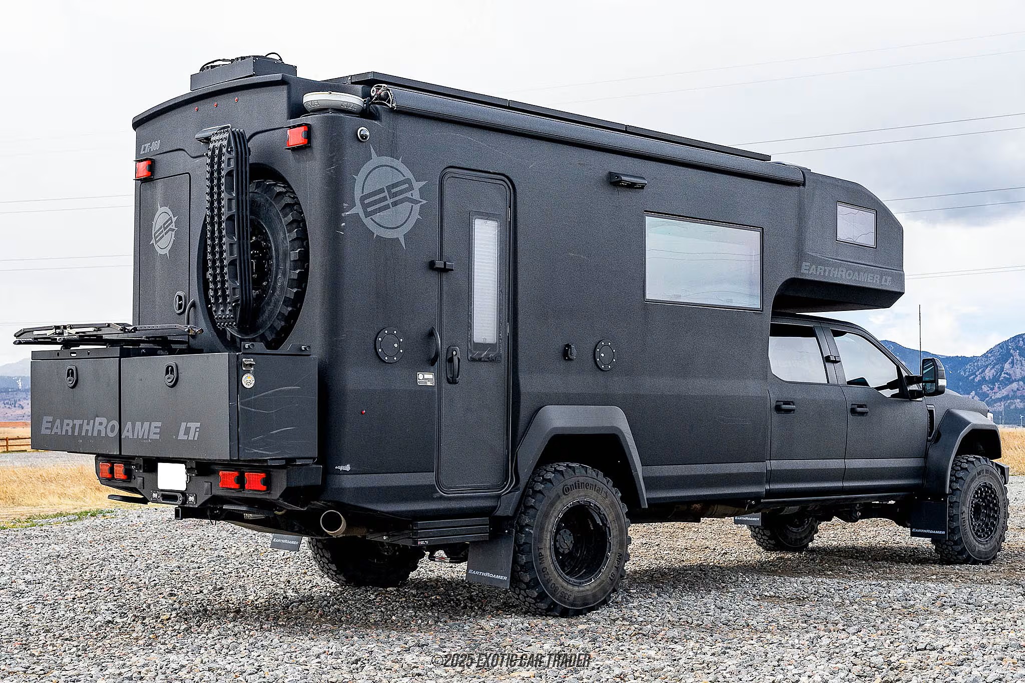 EarthRoamer LTi 068 rear three-quarter view with mountains